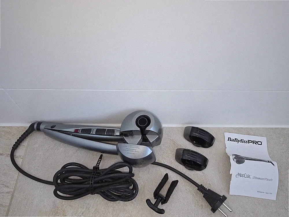 Glätteisen: BaByliss PRO MiraCurl automatischer Lockenstab rollt Haare autom ein